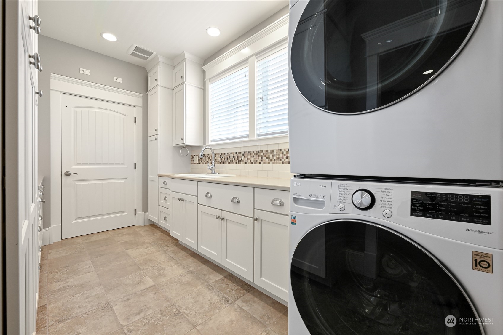 2015 Eldridge Avenue Bellingham, WA 98225 - Photo 36 of 40 a utility room with dryer and washer