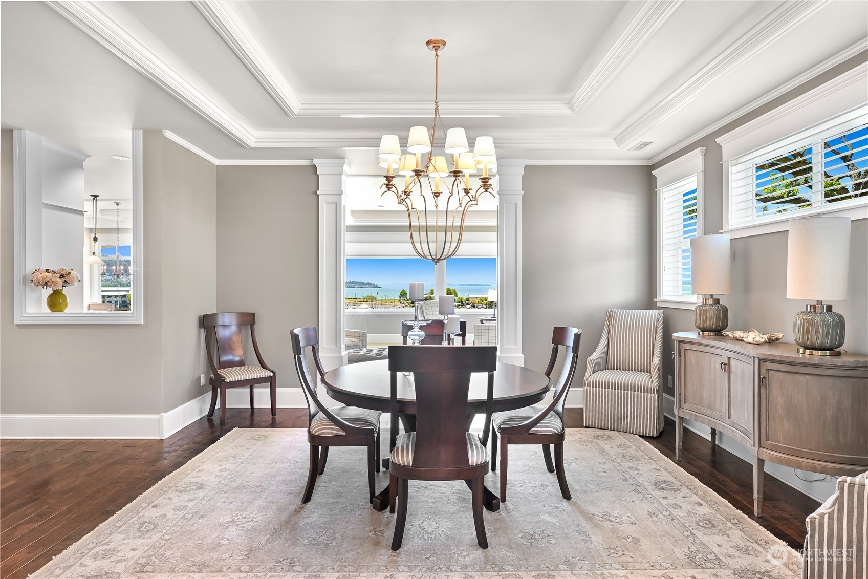 2015 Eldridge Avenue Bellingham, WA 98225 - Photo 8 of 40 a view of a dining room with furniture a chandelier and wooden floor