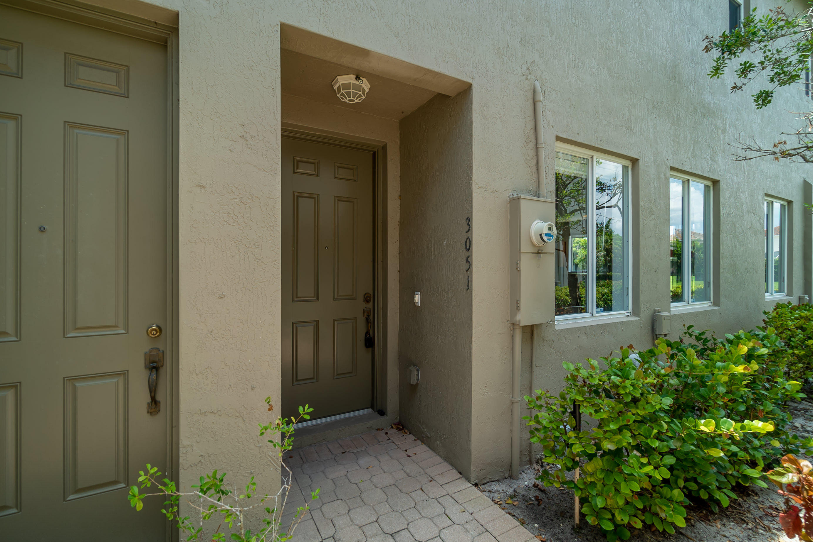 3051 Laurel Ridge Circle Riviera Beach, FL 33404 - Photo 2 of 36 Front Door