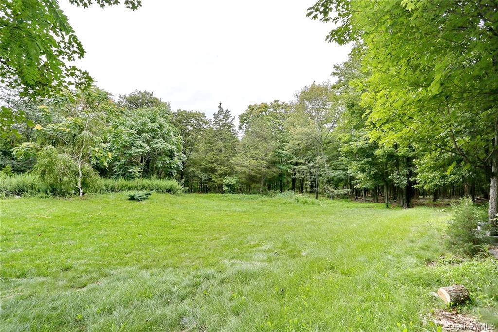 80 Old Quaker Hill Road, Unit 2 Monroe, NY 10950 - Photo 15 of 20 a view of grassy field with trees