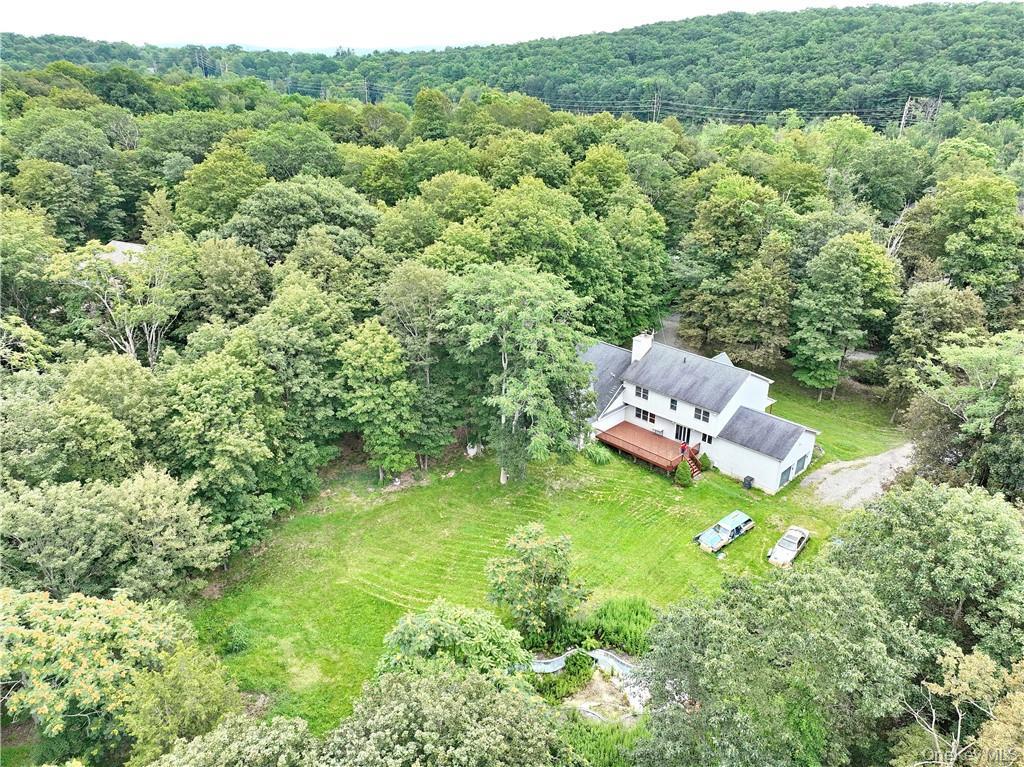 80 Old Quaker Hill Road, Unit 2 Monroe, NY 10950 - Photo 20 of 20 a aerial view of a house with a yard