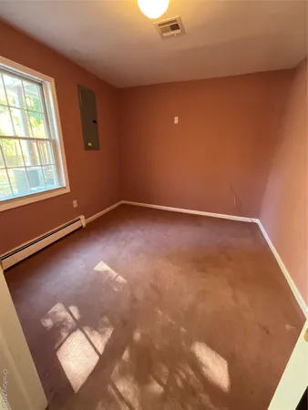 an empty room with a window