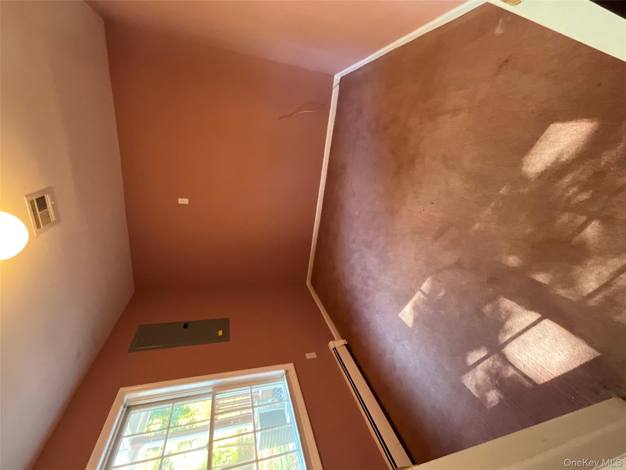 80 Old Quaker Hill Road, Unit 2 Monroe, NY 10950 - Photo 3 of 20 an empty room with a window