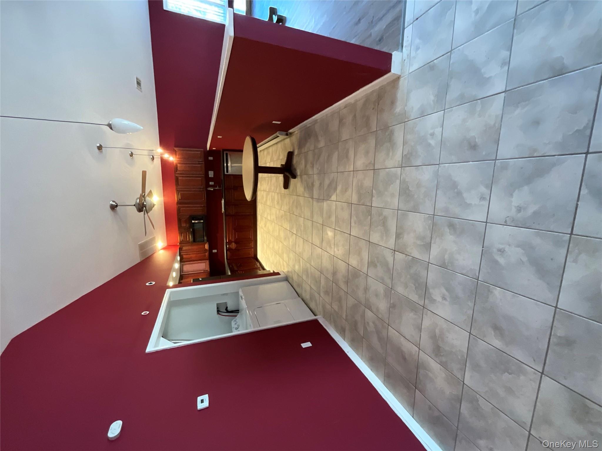 80 Old Quaker Hill Road, Unit 2 Monroe, NY 10950 - Photo 5 of 20 a view of a room with furniture and air hockey table