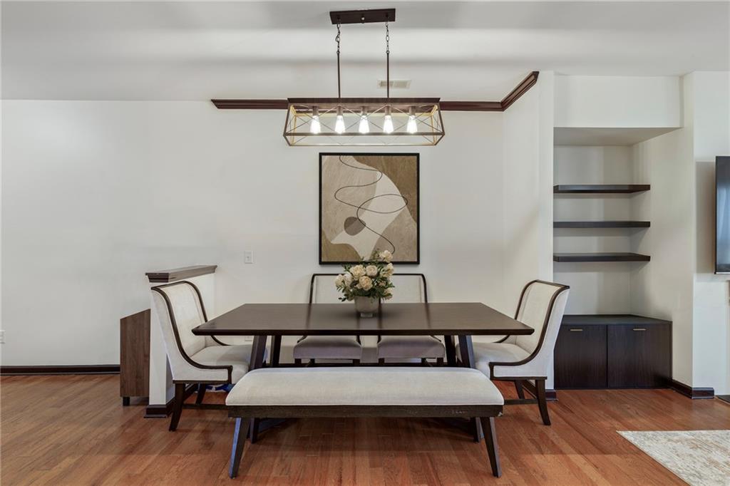 4430 Cedar Bridge Walk Suwanee, GA 30024 - Photo 11 of 33 a reading room with furniture a rug and a window