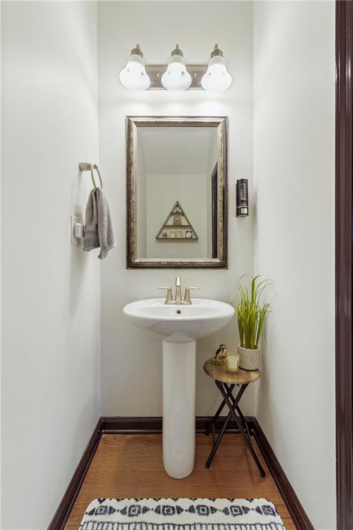 4430 Cedar Bridge Walk Suwanee, GA 30024 - Photo 15 of 33 a bathroom with a sink and a mirror