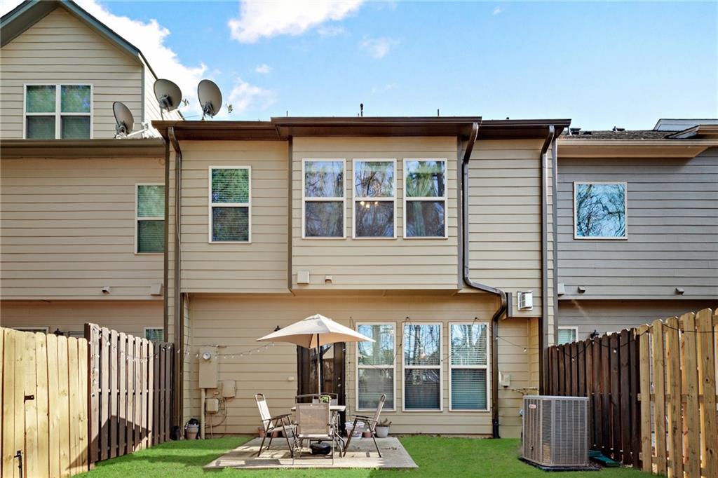 4430 Cedar Bridge Walk Suwanee, GA 30024 - Photo 32 of 33 a front view of a house with garden