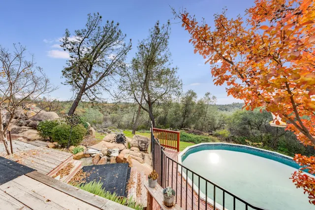 a view of porch with a table chairs and a patio