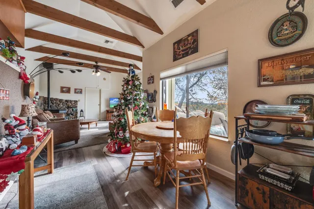 a view of a dining room with furniture window and outdoor kitchen