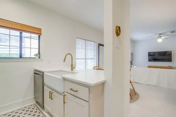 a view of bathroom with dual sinks