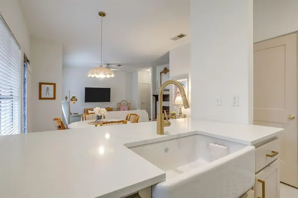 a view of a living room and dining room