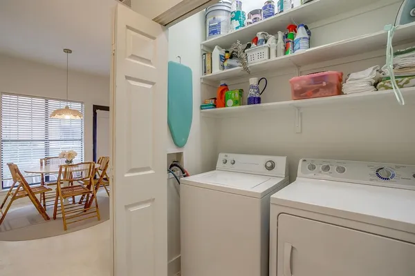 a utility room with dryer and washer
