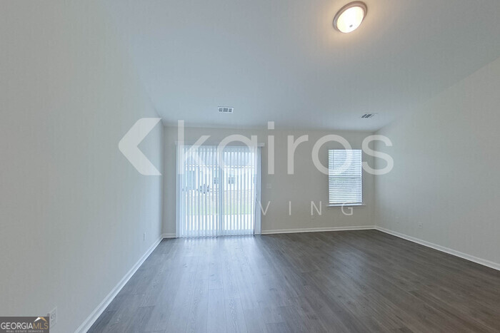 108 St Phillip Way Springfield, GA 31329 - Photo 6 of 29 a view of room with wooden floor