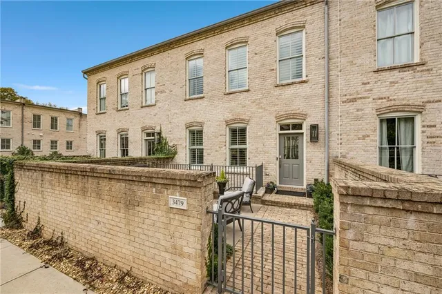a view of a building with a street