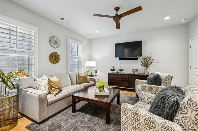 a living room with a couch and a flat screen tv