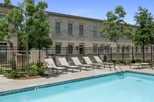 a view of a chairs and table in a patio