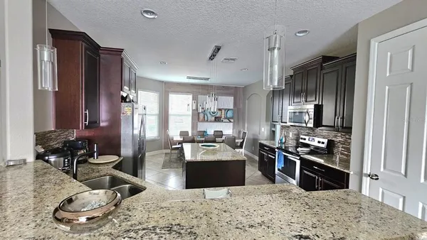 a view of a livingroom from a hallway