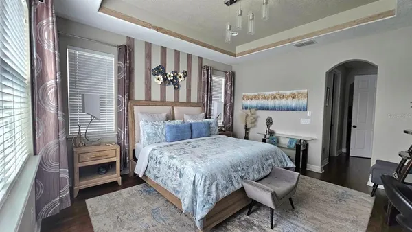 a bathroom with a sink vanity and a mirror