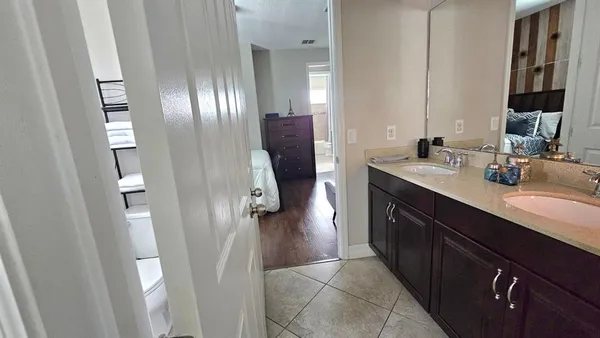 a bathroom with a bathtub and a sink