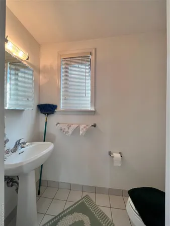 a bathroom with a sink and a toilet