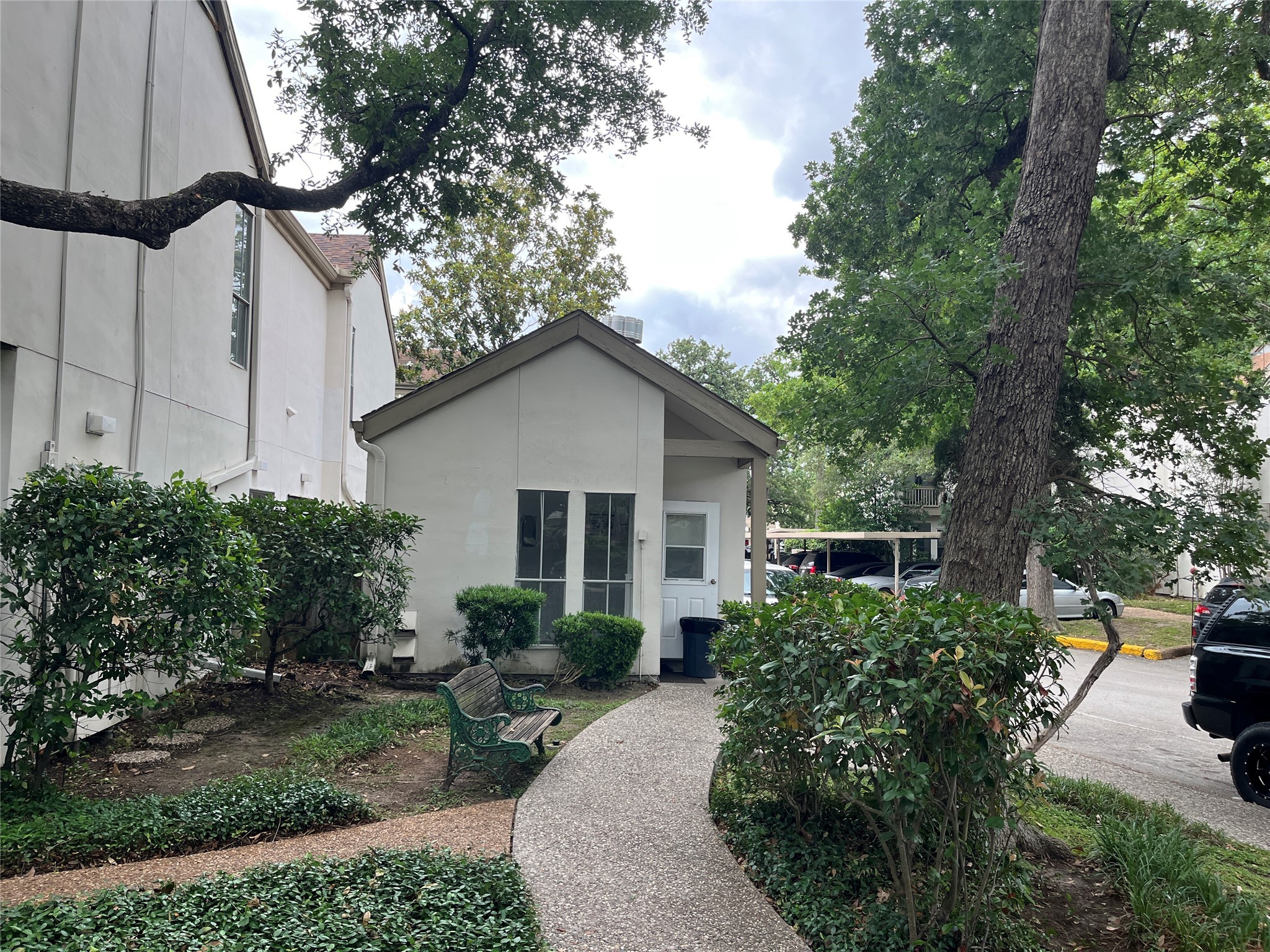 2100 Tanglewilde Street, Unit 536 Houston, TX 77063 - Photo 34 of 37 a house view with a outdoor space