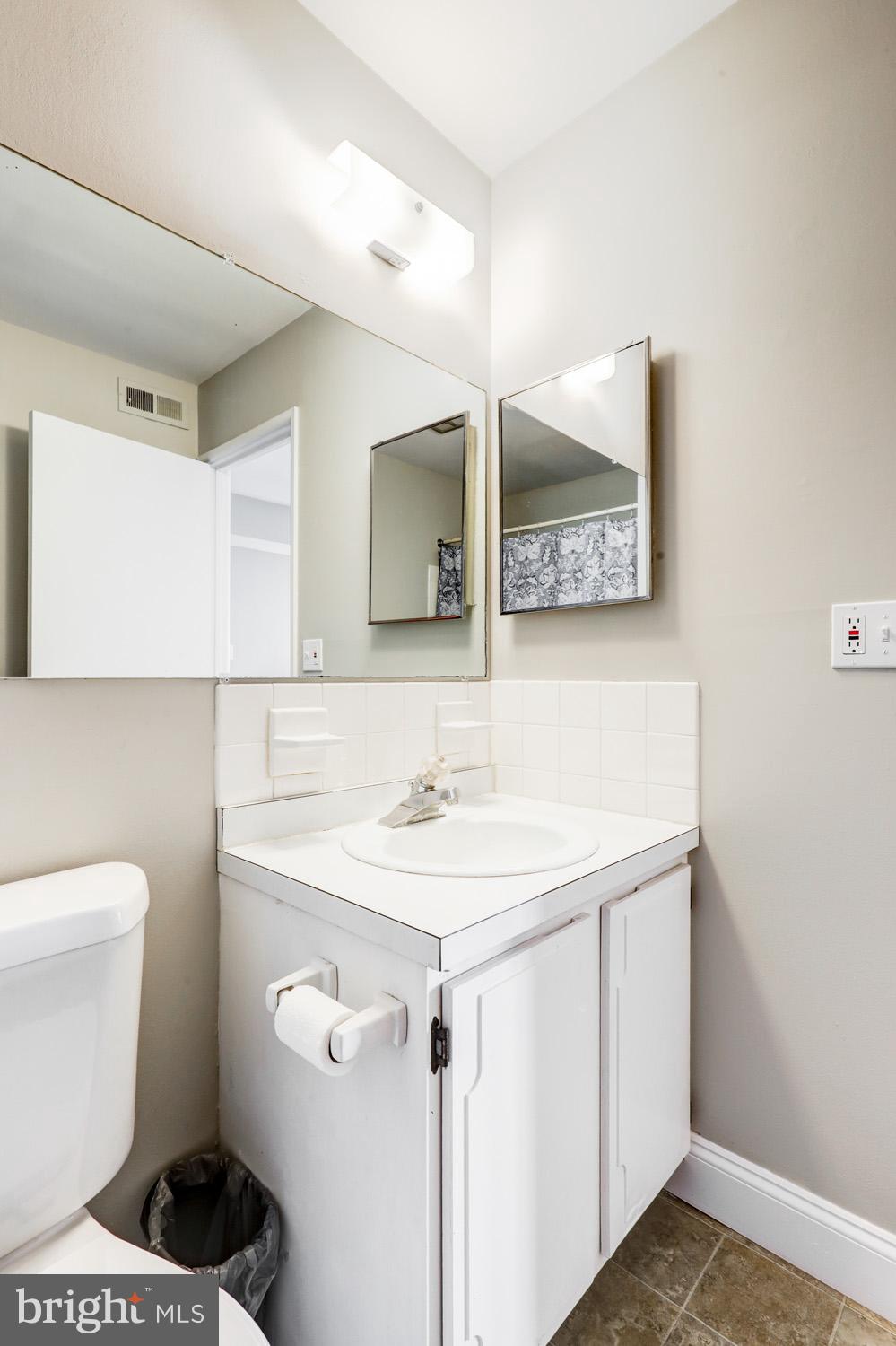 425 Valleybrook Drive Lancaster, PA 17601 - Photo 18 of 50 a bathroom with a sink toilet and mirror