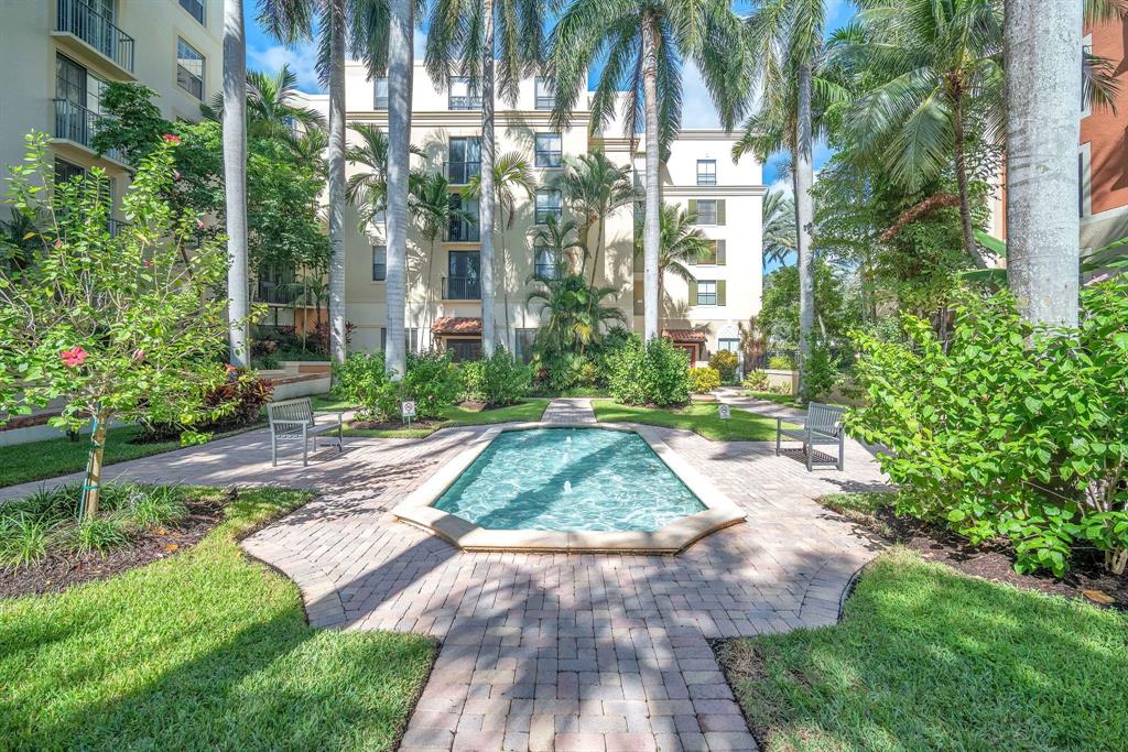 630 South Sapodilla Avenue, Unit 407 West Palm Beach, FL 33401 - Photo 1 of 25 a view of backyard with plants and outdoor seating