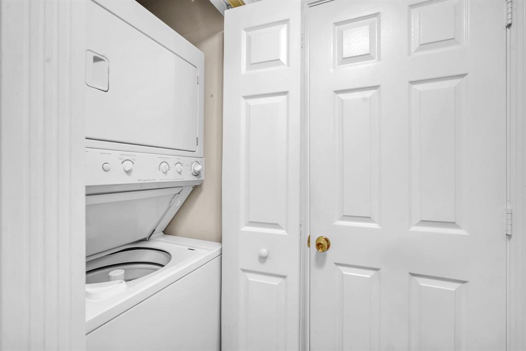 630 South Sapodilla Avenue, Unit 407 West Palm Beach, FL 33401 - Photo 14 of 25 a utility room with dryer and washer