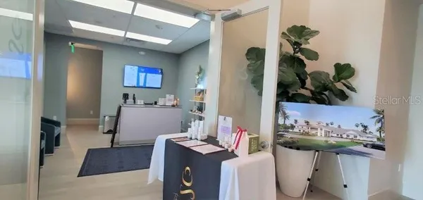 a view of a workspace with furniture