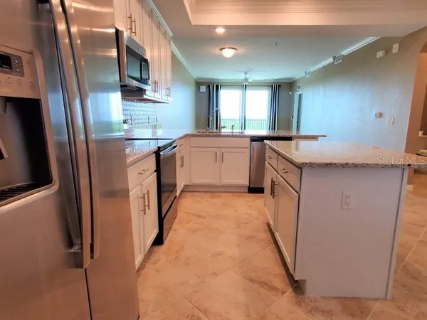 a view of a kitchen with a sink