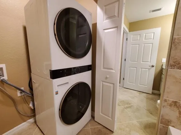 a view of a lake with a big yard