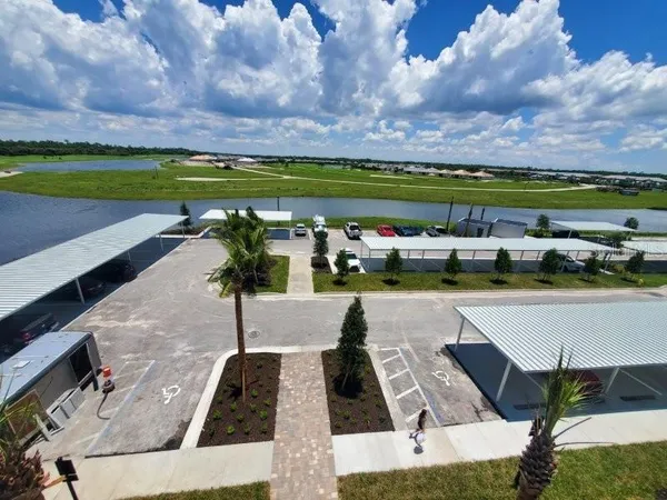 a view of a swimming pool with an outdoor seating