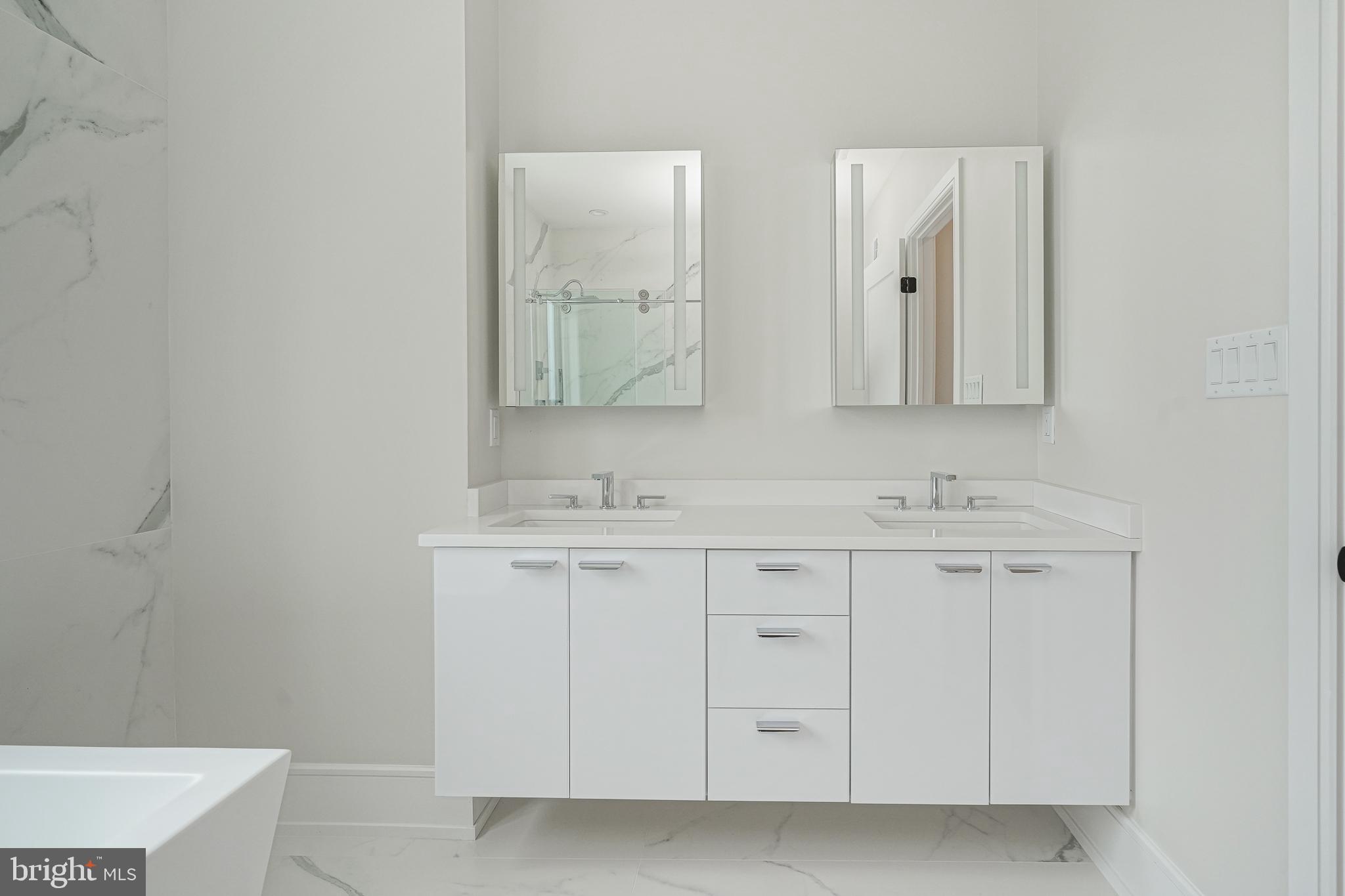 2002 Renaissance Walk, Unit 2 Philadelphia, PA 19145 - Photo 54 of 66 Double vanity / lighted mirrors