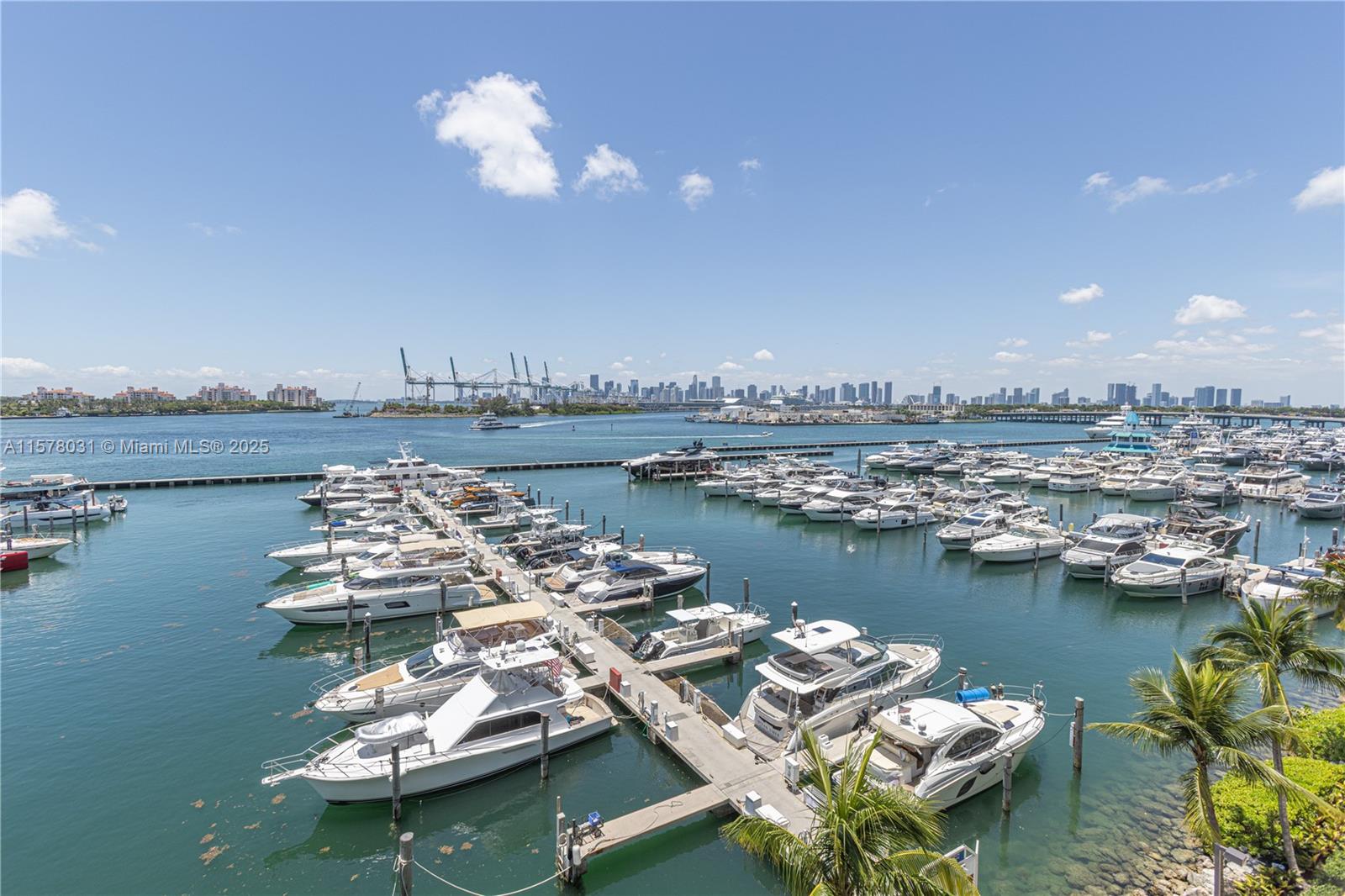 90 Alton Road, Unit 1411 Miami Beach, FL 33139 - Photo 21 of 36 a view of a ocean with boats and water view