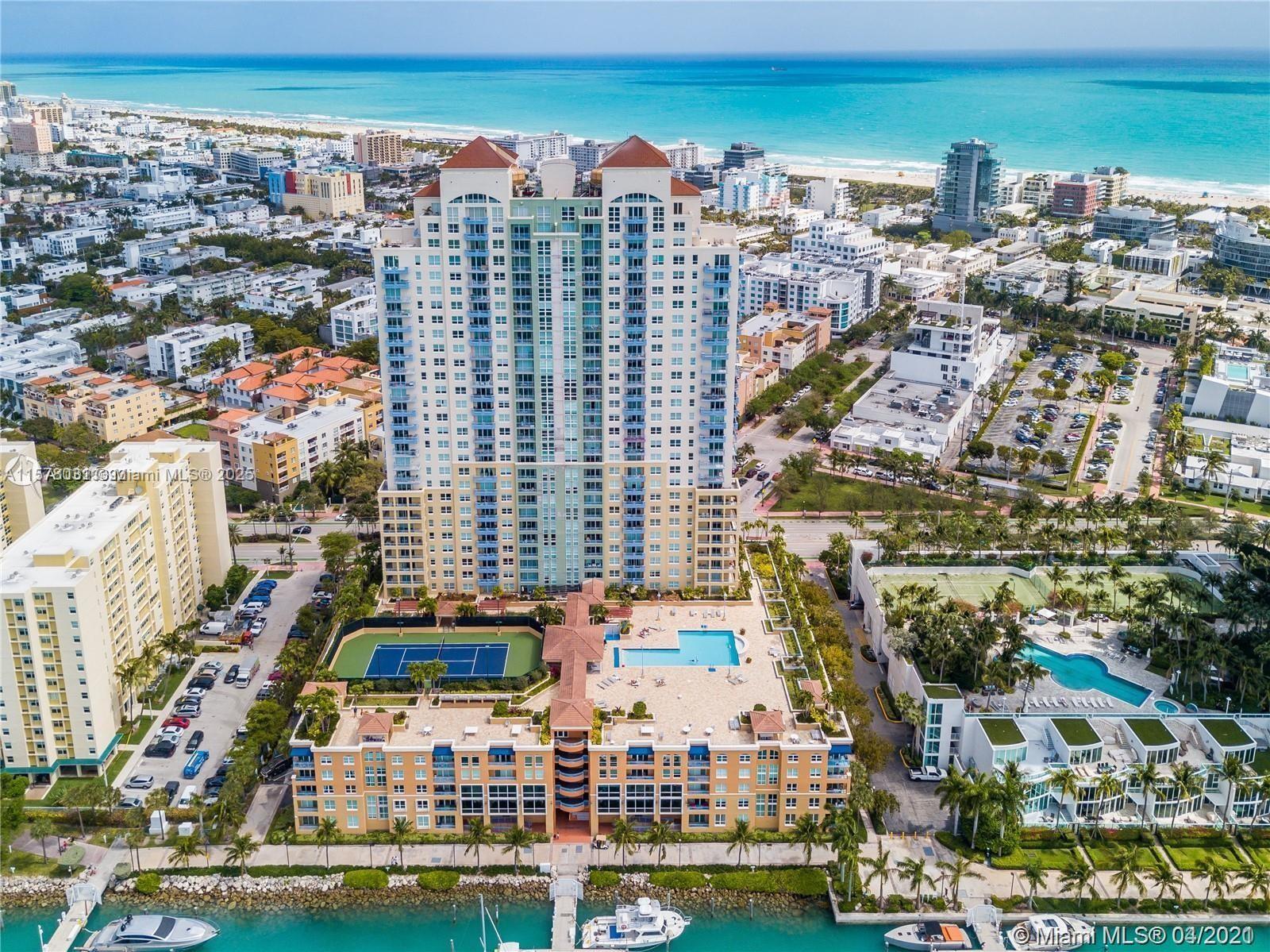 90 Alton Road, Unit 1411 Miami Beach, FL 33139 - Photo 31 of 36 a view of a city with tall buildings