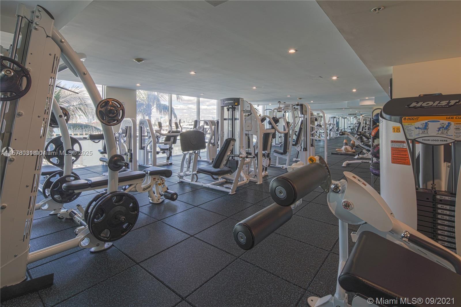 90 Alton Road, Unit 1411 Miami Beach, FL 33139 - Photo 36 of 36 a view of a room with gym equipment
