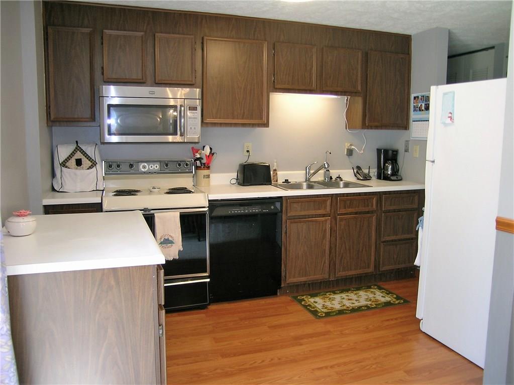 363 Partridge Run Road Gibsonia, PA 15044 - Photo 6 of 25 Kitchen open to Dining Room; updated laminate flooring!
