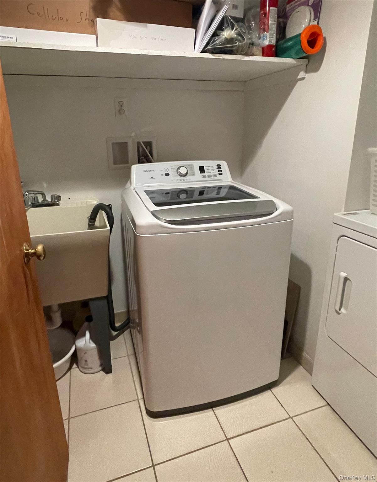 169 Old Mamaroneck Road, Unit B1 White Plains, NY 10605 - Photo 9 of 11 a utility room with dryer and washer