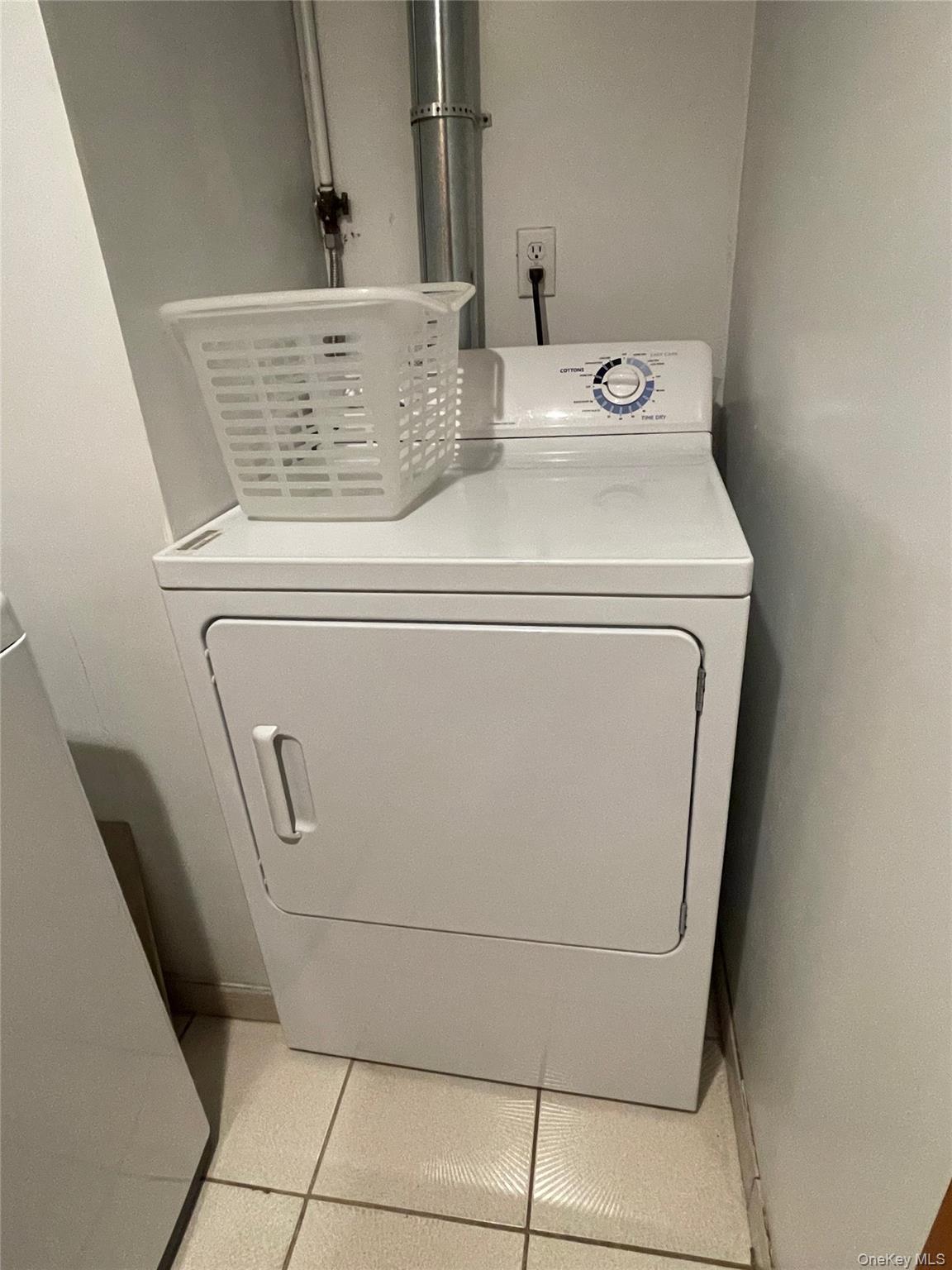 169 Old Mamaroneck Road, Unit B1 White Plains, NY 10605 - Photo 10 of 11 a utility room with dryer and washer