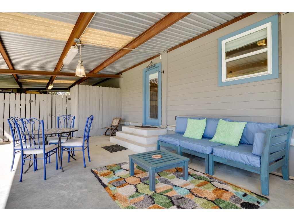 250 Caliche Road Wimberley, TX 78676 - Photo 13 of 40 a outdoor space with furniture