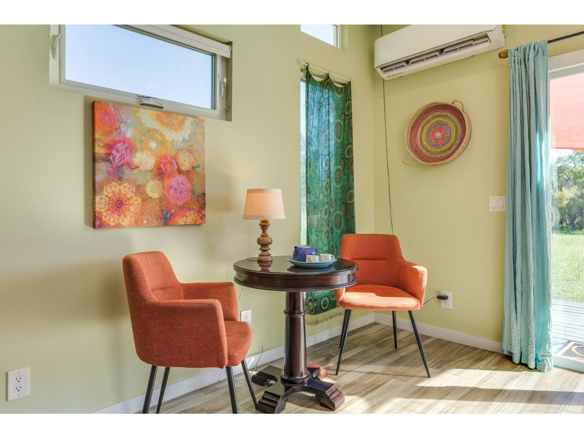 250 Caliche Road Wimberley, TX 78676 - Photo 23 of 40 a view of a dinning room with furniture and a window