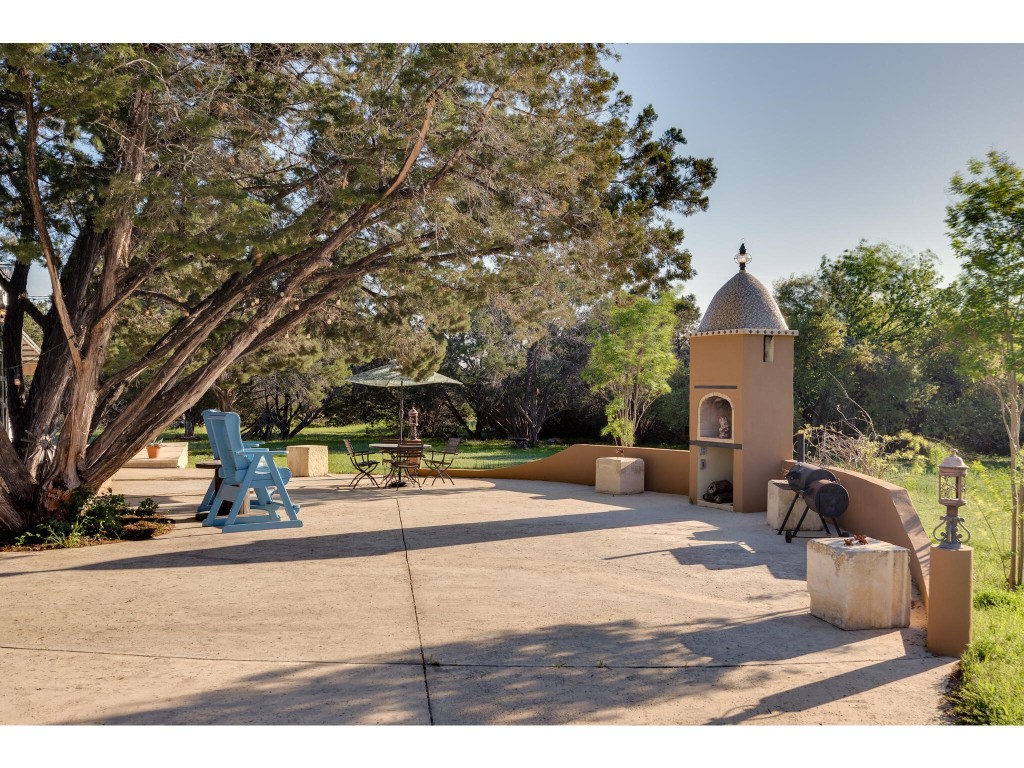250 Caliche Road Wimberley, TX 78676 - Photo 34 of 40 a view of outdoor space yard and tree