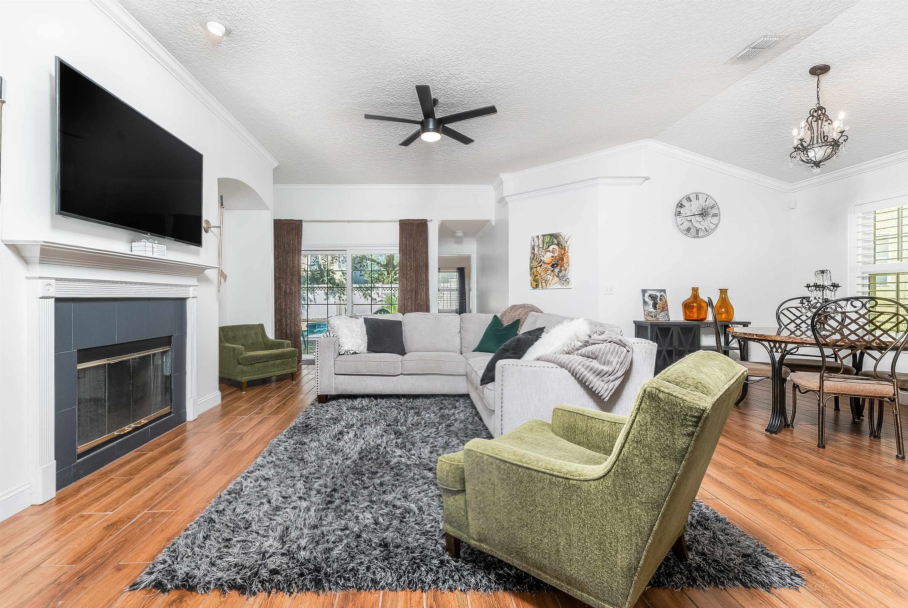 1236 Splendid Ravine Street St. Augustine, FL 32092 - Photo 11 of 47 a living room with furniture fireplace and flat screen tv
