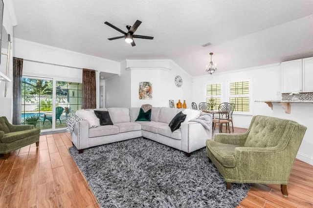 a living room with furniture or outdoor view and a large window
