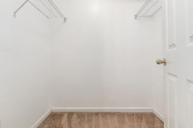 a view of a room with racks on the wall