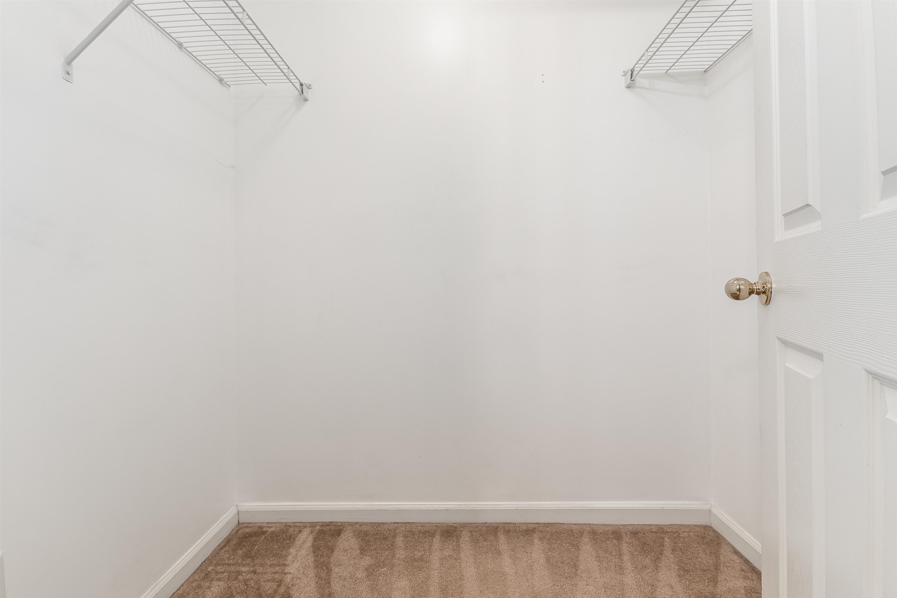 1236 Splendid Ravine Street St. Augustine, FL 32092 - Photo 32 of 47 a view of a room with racks on the wall