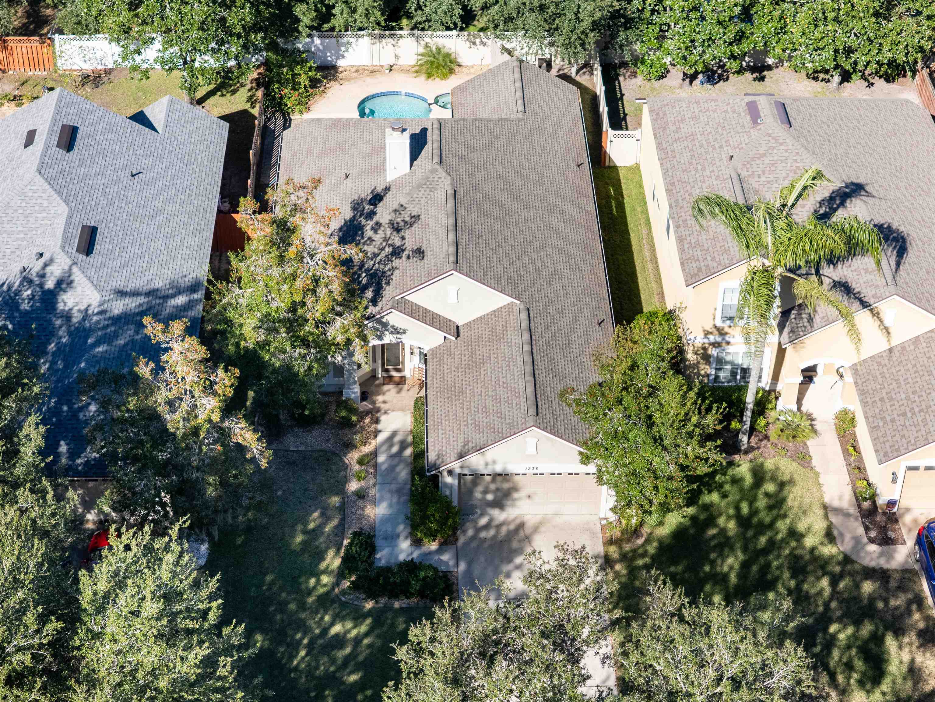 1236 Splendid Ravine Street St. Augustine, FL 32092 - Photo 40 of 47 an aerial view of a house with a yard and a garden