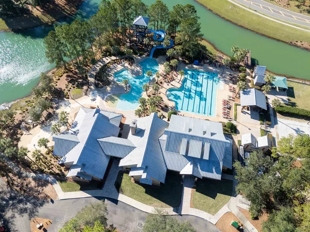 a view of a chairs and table in the patio
