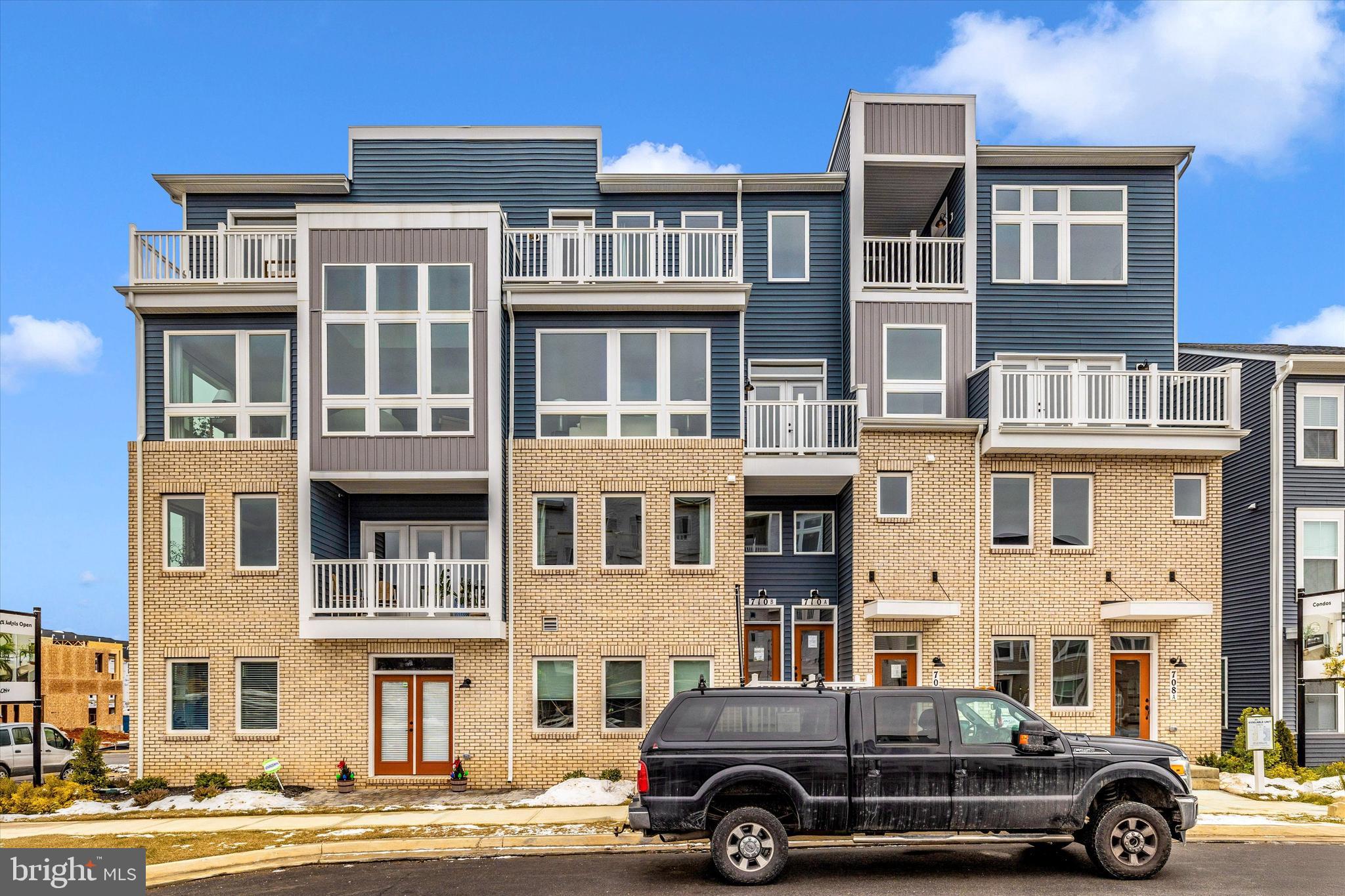 709 Iron Frg Road, Unit B Frederick, MD 21702 - Photo 3 of 32 a car parked in front of a building
