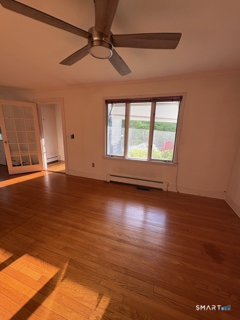 33 Flanders Road Bethlehem, CT 06751 - Photo 6 of 18 a view of room with window and wooden floor